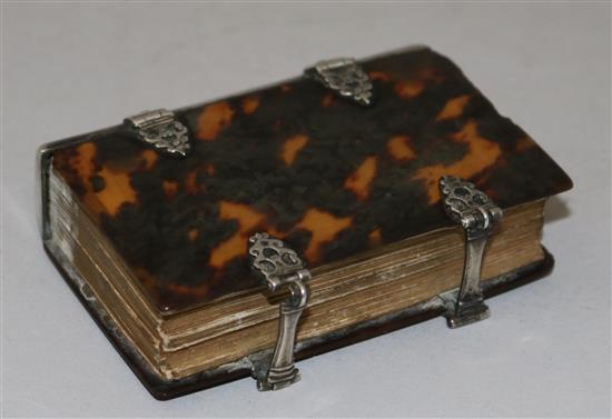 An 18th century silver mounted tortoiseshell German prayer book, 80mm.